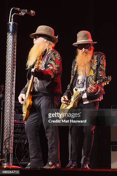 Dusty Hill and Billy Gibbons of ZZ Top perform on stage at The Moore Theater on March 23, 2014 in Seattle, Washington.