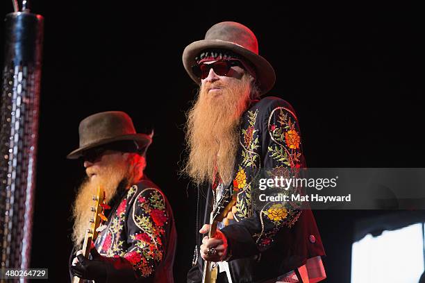 Dusty Hill and Billy Gibbons of ZZ Top perform on stage at The Moore Theater on March 23, 2014 in Seattle, Washington.