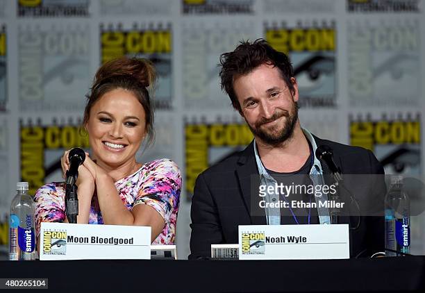 Actress Moon Bloodgood and actor Noah Wyle speak onstage at the "Falling Skies" The Farewell panel during Comic-Con International 2015 at the San...