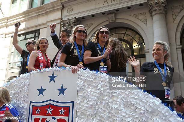 Abby Wambach, Michaela Cuomo, and Governor Andrew Cuomo ride in a ticker-tape parade commemorating the World Cup victory of the U.S. Women's National...