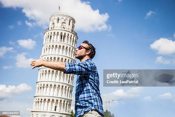 young tourist having fun in pisa - funny tourist stock pictures, royalty-free photos & images