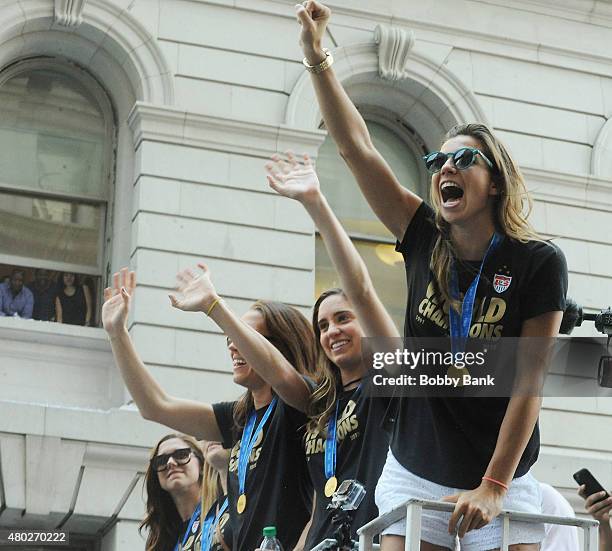 Alex Morgan, Tobin Heath, Lauren Holiday, Amy Rodriguez and Morgan Brian during the New York City Holds Ticker Tape Parade For World Cup Champions...