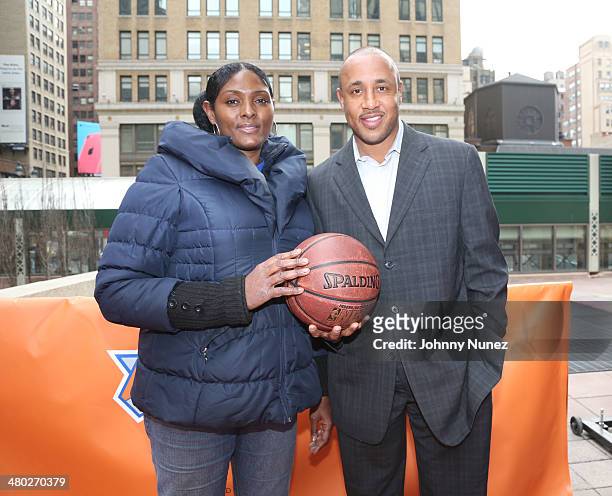 Kym Hampton and John Starks attend the Knicks Latino Night Game & Los Knicks Fan Fest at Madison Square Garden on March 23, 2014 in New York City.