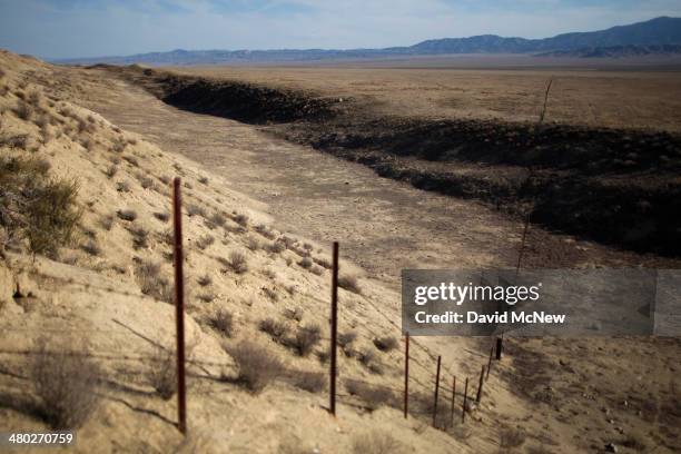 The San Andreas Fault rift zone is seen on the west side of Temblor Ridge which divides it from the oil fields of the Monterey Shale formation where...