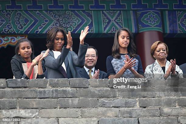 First Lady Michelle Obama with her daughters Malia Obama and Sasha Obama , mother Marian Robinson visit the Xi'an City Wall on March 24, 2014 in...
