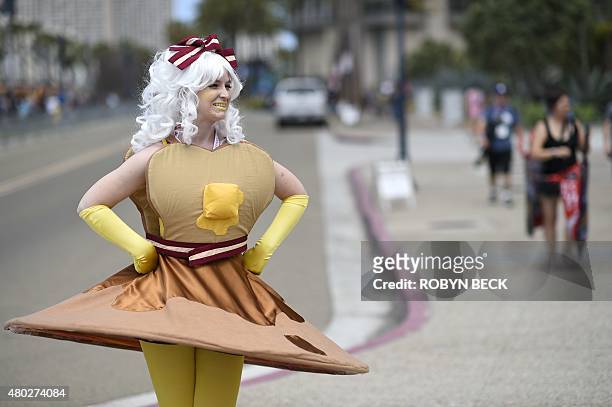 Maggie Kulzick portraits the Breakfast Princess from the cartoon "Adventure Time" at Comic Con International 2015 in San Diego on July 10, 2015. AFP...