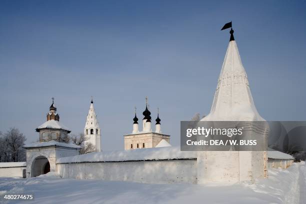 The walls of the Aleksandrovsky monastery, possibly founded in 1240 by Alexander Nevsky, with the church and the bell tower of the Ascension in the...