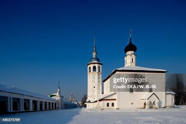 The Church of the Resurrection , the market arcades on the left, Suzdal. Golden Ring, Russia.
