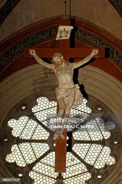 Crucifiction and rose window, Basilica of Sant'Andrea , Vercelli, Piedmont, Italy.