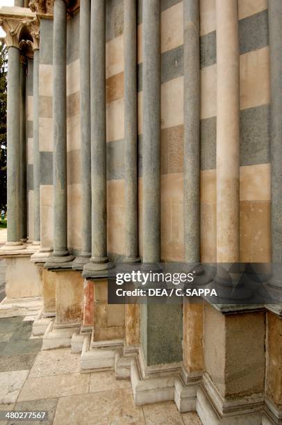 The columns of one of the Romanesque style portals of Basilica of Sant'Andrea, Vercelli, Piedmont, Italy. Detail.