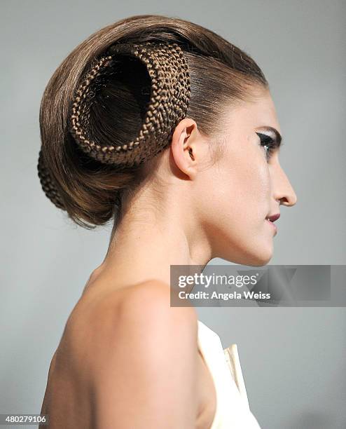 Model walks the runway at the MICHALSKY StyleNite 2015 at Ritz Carlton on July 10, 2015 in Berlin, Germany.