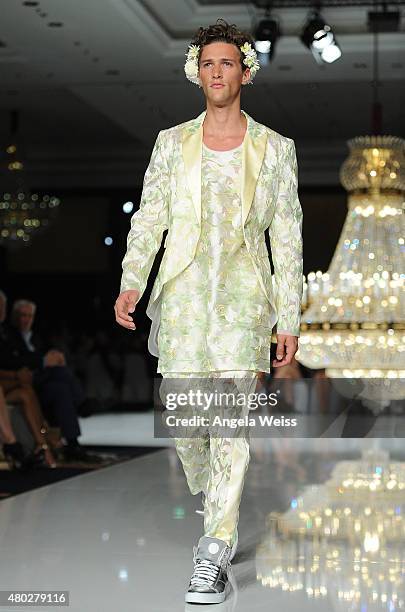 Model walks the runway at the MICHALSKY StyleNite 2015 at Ritz Carlton on July 10, 2015 in Berlin, Germany.