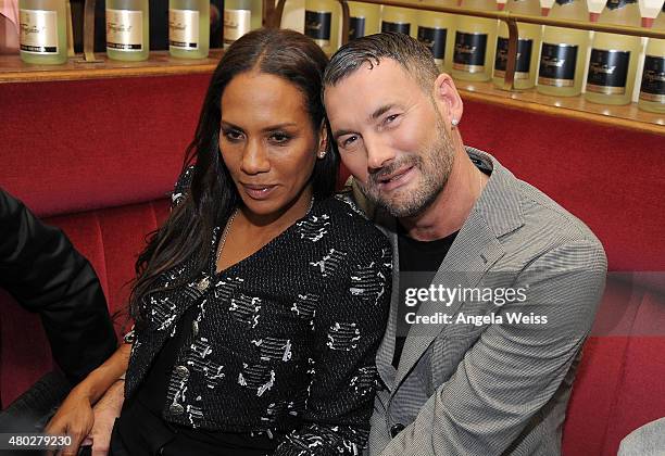 Designer Michael Michalsky and Barbara Becker attend the MICHALSKY StyleNite 2015 at Ritz Carlton on July 10, 2015 in Berlin, Germany.
