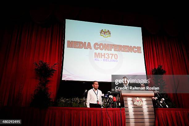 Malaysia's Minister of Defence and acting Minister of Transport Hishammuddin Hussein speaks during a press conference at Putra World Trade Centre on...