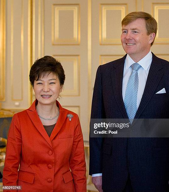 President Park Geun-hye of South Korea and King Willem-Alexander of the Netherlands pose for a photo at Noordeinde Palace on March 24, 2014 in...