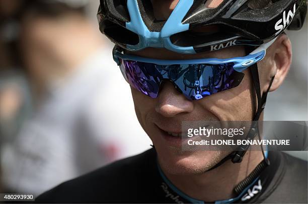 Great Britain's Christopher Froome smiles as he waits for the start of the 191.5 km sixth stage of the 102nd edition of the Tour de France cycling...