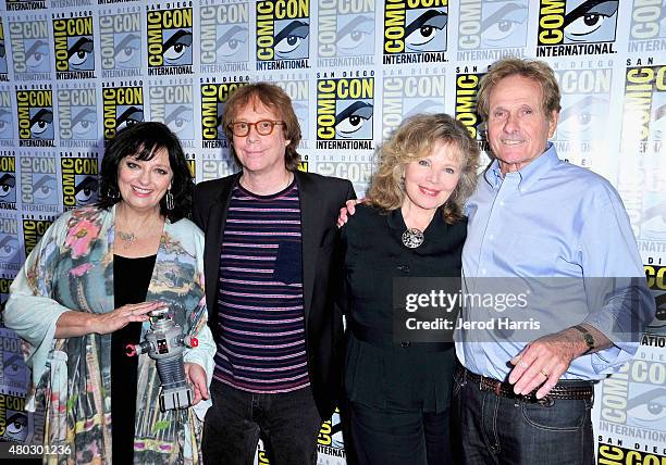 Actors Angela Cartwright, Bill Mumy, Marta Kristen and Mark Goddard attend "Lost In Space" Press Room during Comic-Con International 2015 at Hilton...