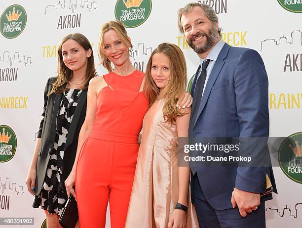 Maude Apatow, Leslie Mann, Iris Apatow and Judd Apatow attend a screening of "Trainwreck" at Montrose Stadium 12 on July 10, 2015 in Akron, Ohio.