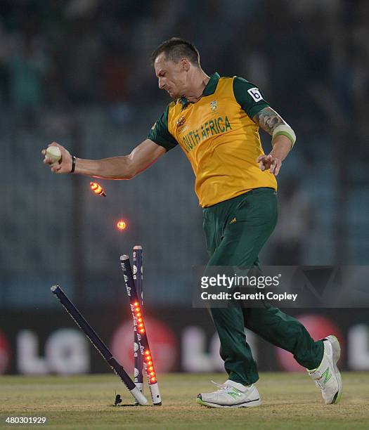 Dale Steyn of South Africa celebrates running out Ross Taylor of New Zealand to win the ICC World Twenty20 Bangladesh 2014 Group 1 match between New...