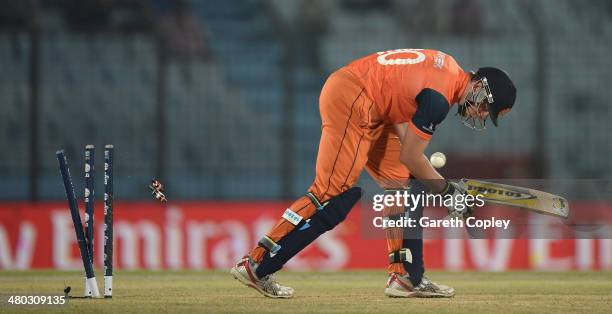 Logan van Beek of the Netherlands is bowled by Lasith Malinga of Sri Lanka during the ICC World Twenty20 Bangladesh 2014 Group 1 match between Sri...