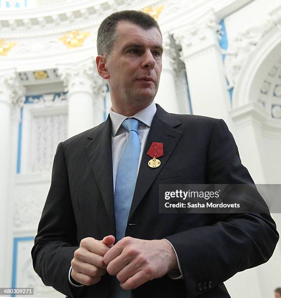 Russian businessman Milkhail Prokhorov attends a state award ceremony honoring participants of the Olympic and Paralympics Games in Sochi in the...