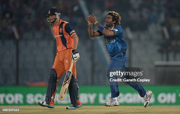 Lasith Malinga of Sri Lanka celebrates after dismissing Mudassar Bukhari of the Netherlands during the ICC World Twenty20 Bangladesh 2014 Group 1...