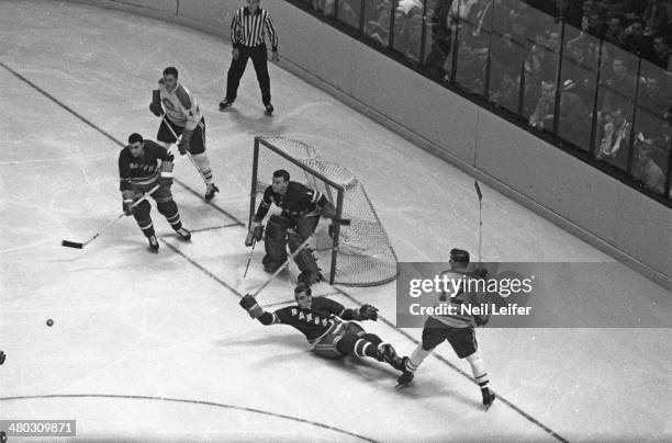 Aerial view of Montreal Canadiens goalie Jacques Plante in action vs New York Rangers at Madison Square Garden. New York, NY 1/3/1959 - CREDIT: Neil...