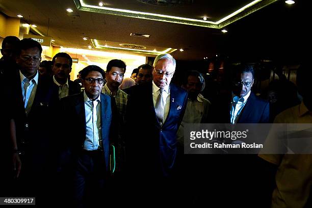 Prime Minister of Malaysia , Najib Razak leaves after an ad hoc press conference on March 24, 2014 in Kuala Lumpur, Malaysia. Prime Minister Najib...