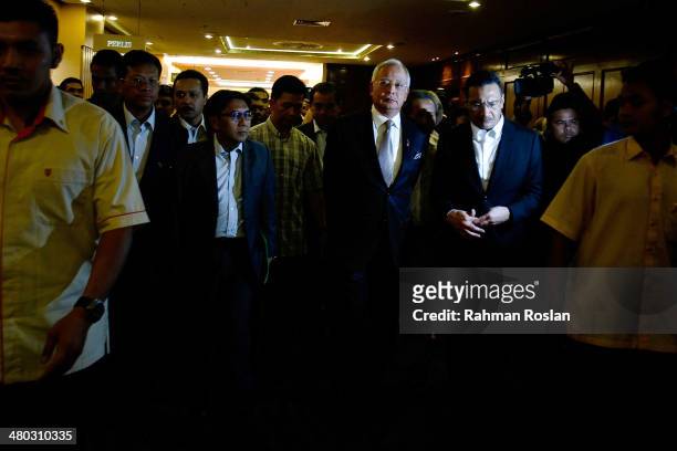 Prime Minister of Malaysia, Najib Razak leaves after an ad hoc press conference on March 24, 2014 in Kuala Lumpur, Malaysia. Prime Minister Najib...