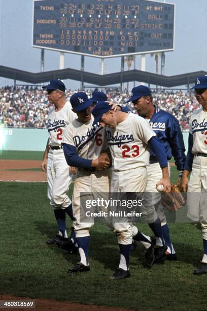 World Series: Los Angeles Dodgers Claude Osteen victorious with Ron Fairly after winning Game 3 vs Minnesota Twins at Dodger Stadium. Los Angeles, CA...