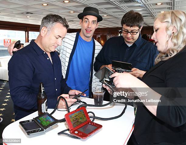 Actors Larry Murphy, John Roberts, and Eugene Mirman attend The Nintendo Lounge on the TV Guide Magazine yacht during Comic-Con International 2015 on...