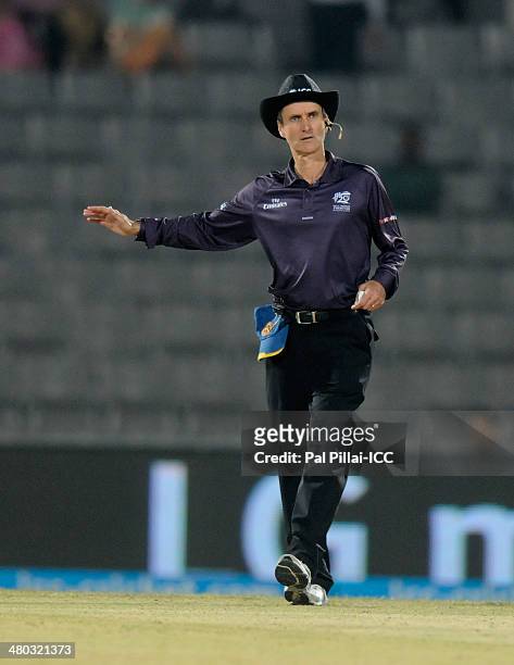 Umpire Billy Bowden signals a boundary during the ICC Women's world Twenty20 match between India Women and Sri Lanka Women played at Sylhet...