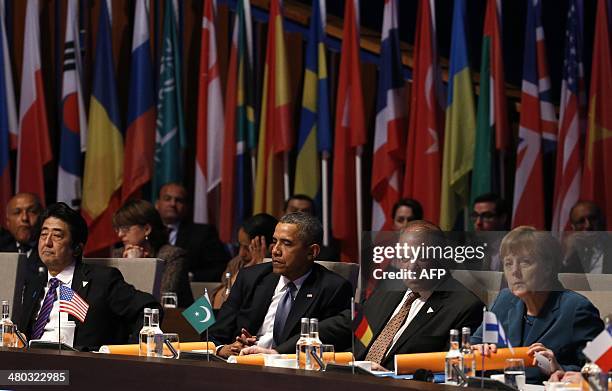 Japanese Prime Minister Shinzo Abe, US President Barack Obama, Pakistan's Prime Minister Nawaz Sharif and German Chancellor Angela Merkel attend the...