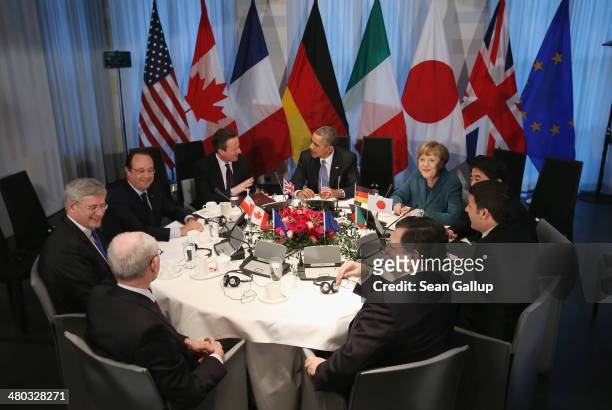 European Union Council President Herman Van Rompuy, Canadian Prime Minister Stephen Harper, French President Francois Hollande, British Prime...