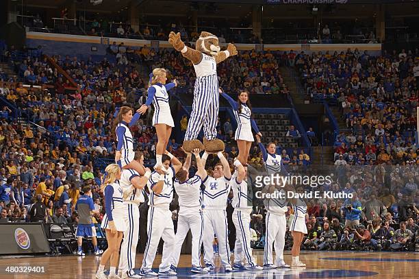 Playoffs: Kentucky Wildcats mascot The Wildcat forming pyramid with cheerleaders on court during game vs Wichita State at Scottrade Center. St....