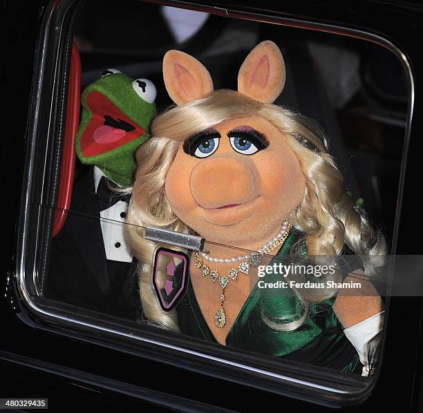 Kermit the frog and Miss Piggy attend the VIP screening of "The Muppets Most Wanted" at The Curzon Mayfair on March 24, 2014 in London, England.