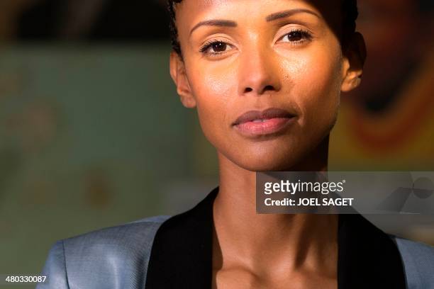 French actress and former Miss France Sonia Rolland poses, on March 24, 2014 in Paris, prior to take part in a press conference focused on the art...