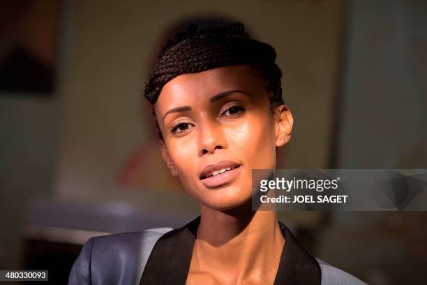 French actress and former Miss France Sonia Rolland poses, on March 24, 2014 in Paris, prior to take part in a press conference focused on the art...