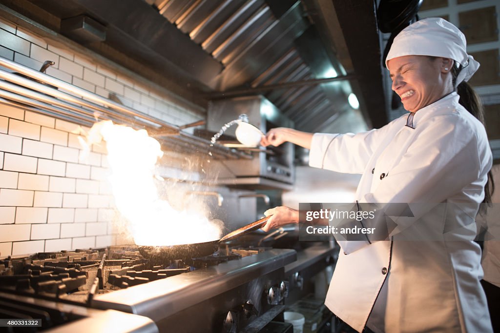 Scared Cooking Chef Looking Scared While Cooking A Stir Fry High-Res Stock Photo ...