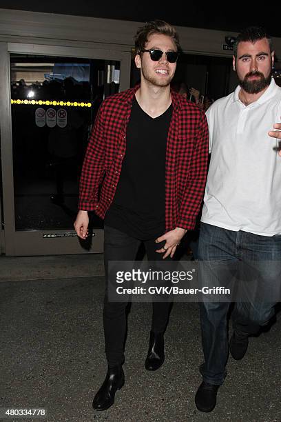 Luke Hemmings of Five Seconds of Summer are seen at LAX. On July 10, 2015 in Los Angeles, California.