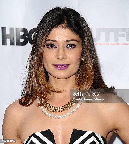 Actress Pooja Batra attends the opening night gala of "Tig" at the 2015 Outfest Los Angeles LGBT film festival at Orpheum Theatre on July 9, 2015 in...