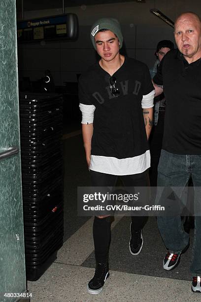 Calum Hood of Five Seconds of Summer are seen at LAX. On July 10, 2015 in Los Angeles, California.