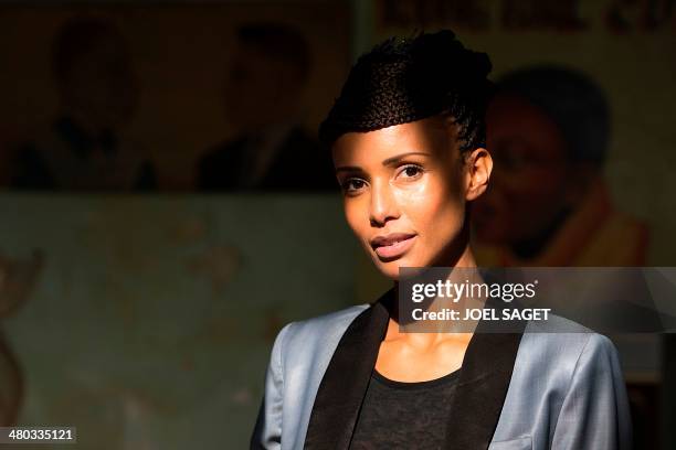 French actress and former Miss France Sonia Rolland poses, on March 24, 2014 in Paris, prior to take part in a press conference focused on the art...