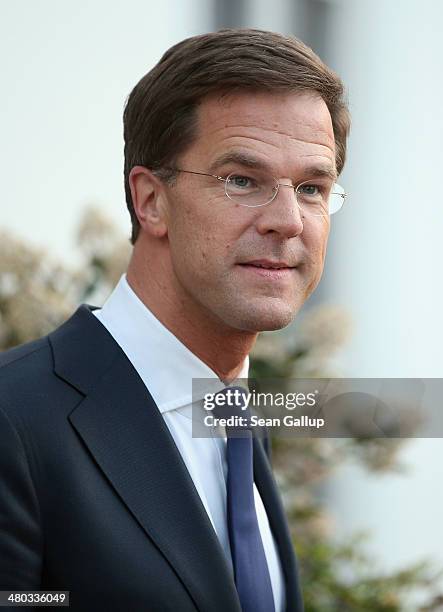 Dutch Prime Minister Mark Rutte greets leaders arriving for a meeting of G7 leaders on March 24, 2014 in The Hague, Netherlands. The G7 leaders are...