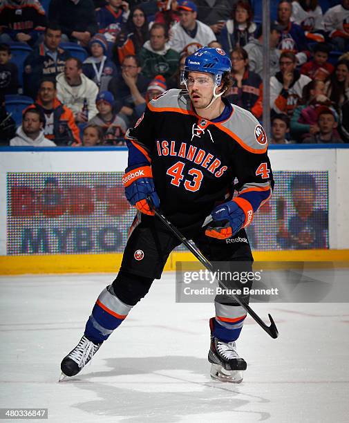 Mike Halmo of the New York Islanders skates against the Columbus Blue Jackets at the Nassau Veterans Memorial Coliseum on March 23, 2014 in...