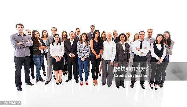 large group of smiling business people looking at the camera. - crowd of people white background stock pictures, royalty-free photos & images