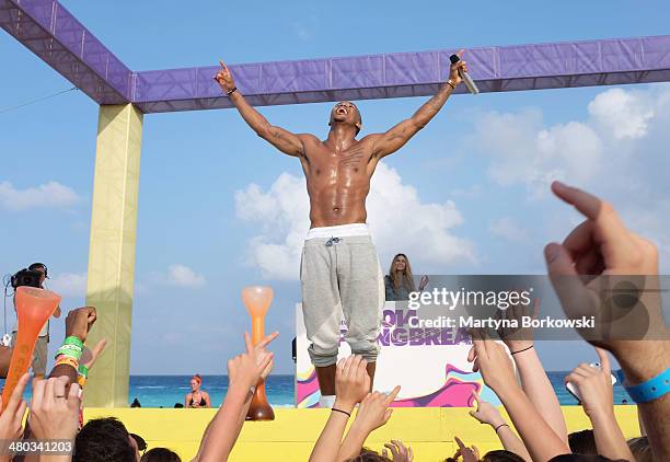 Trey Songz performs onstage at mtvU Spring Break 2014 at the Grand Oasis Hotel on March 21, 2014 in Cancun, Mexico. "mtvU Spring Break" starts airing...
