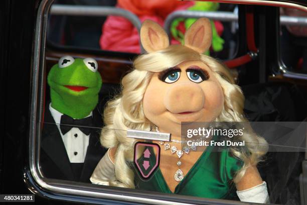 Kermit and Miss Piggy attend the VIP screening of 'Muppets Most Wanted' at The Curzon Mayfair on March 24, 2014 in London, England.
