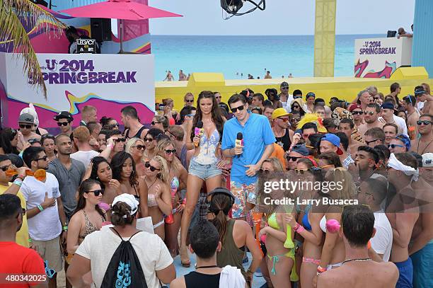 Hosts April Rose and Andrew Schulz host mtvU Spring Break 2014 at the Grand Oasis Hotel on March 21, 2014 in Cancun, Mexico. "mtvU Spring Break"...