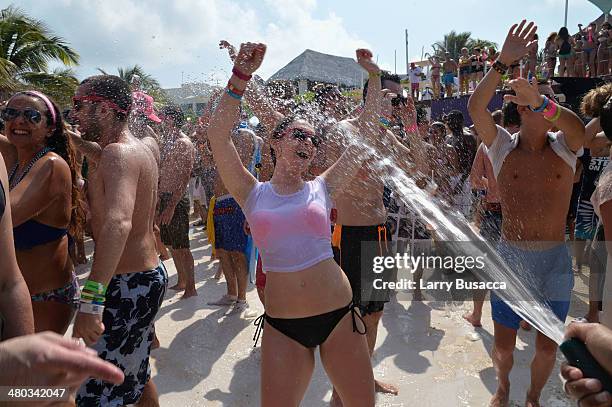 Spring breakers attend mtvU Spring Break 2014 at the Grand Oasis Hotel on March 21, 2014 in Cancun, Mexico. "mtvU Spring Break" starts airing March...